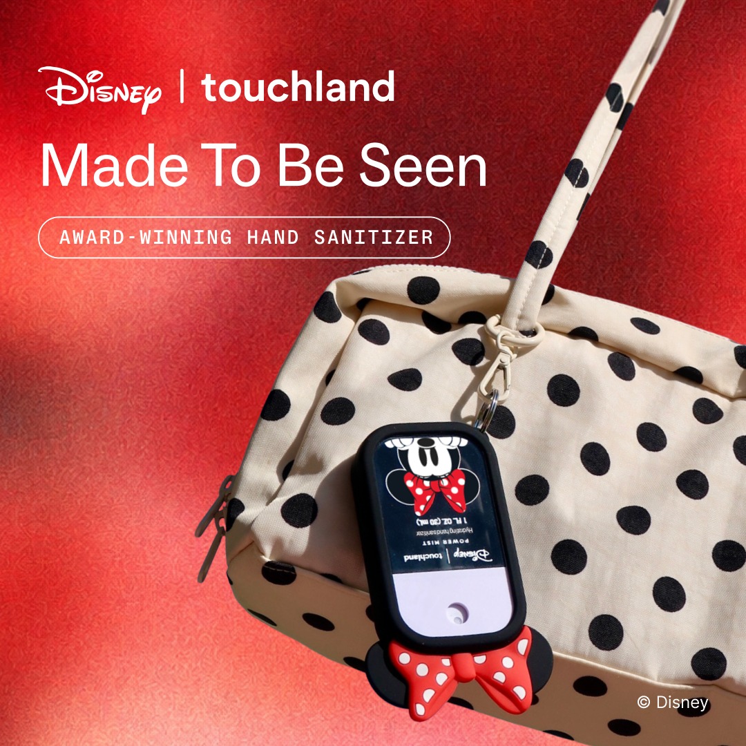 Touchland — Disney Minnie sanitizer case clipped to a polka-dot bag