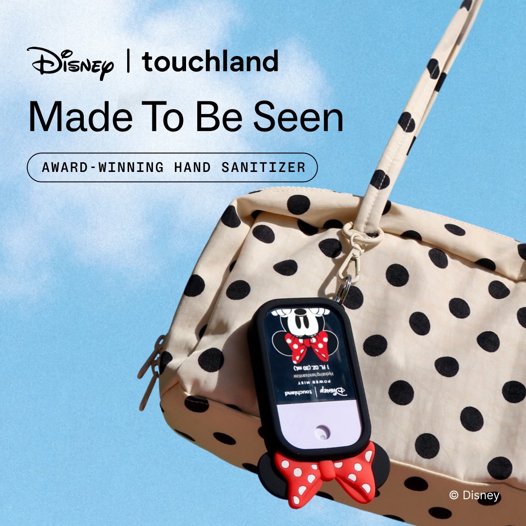 Touchland — Disney Minnie sanitizer case clipped to a polka-dot bag