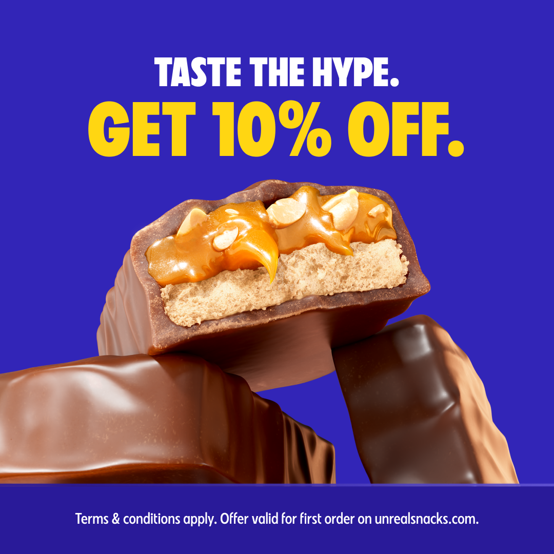 UNREAL Snacks — Caramel peanut nougat bar close-up with a 10% first-order offer
