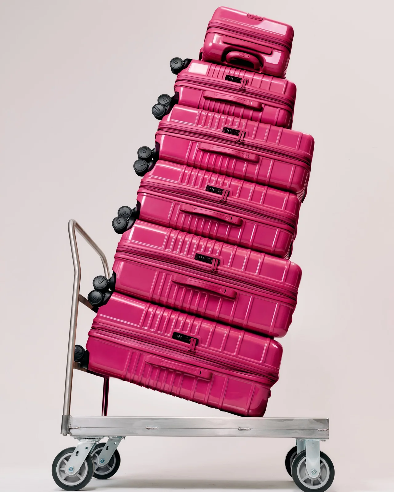 Rare Beauty — Raspberry luggage stacks and matching makeup preview the Limitless collection