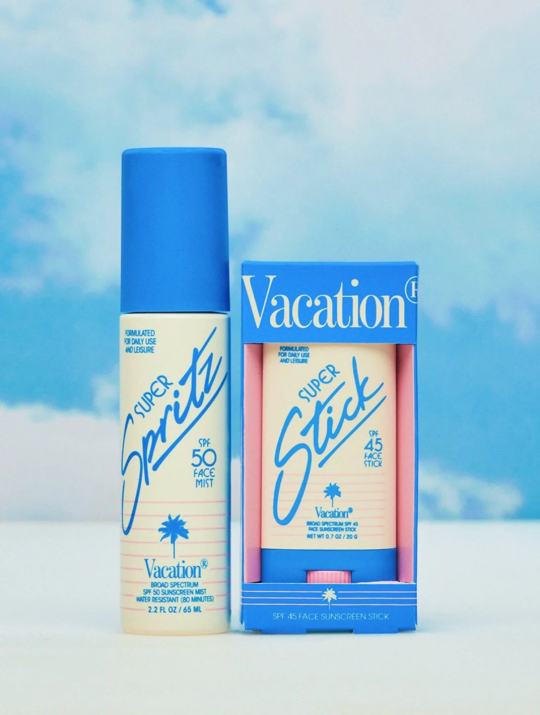 Vacation — Super Spritz and Super Stick against a cloudy blue backdrop